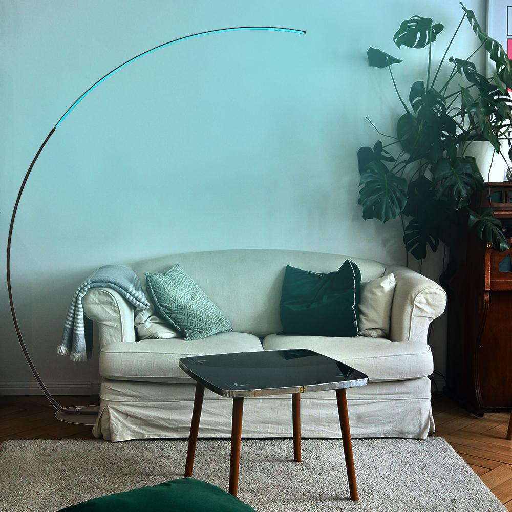 arched floor lamp by Inoleds lights a room